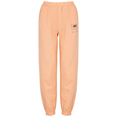 P.e Nation Grand Stand Tapered-leg Mid-rise Organic-cotton Jogging Bottoms In Orange