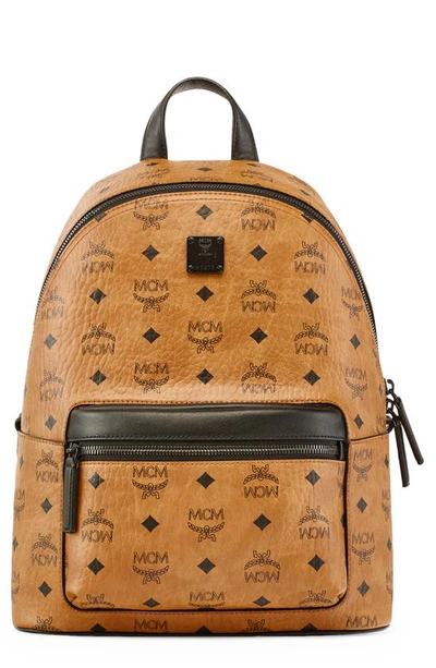 Mcm Medium Stark Monogram-print Backpack In Brown