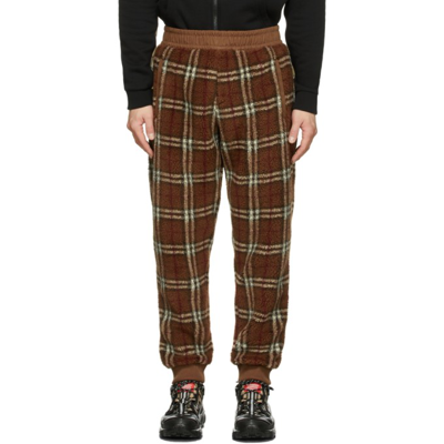 Burberry Tapered Checked Twill-trimmed Fleece Sweatpants In Brown