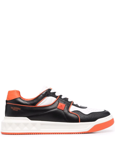 Valentino Garavani Roman Stud Sneakers In Orange
