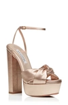 Aquazzura Olie Plateau 140 Knotted Metallic Leather Platform Sandals In Light Copper