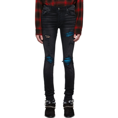 Amiri Mx1 Cracked Paint Skinny Jeans In Aged Black