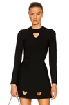 Alaïa Cutout Heart Long Sleeve Top In Noir