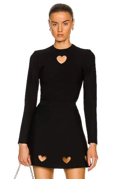 Alaïa Cutout Heart Long Sleeve Top In Noir Alaia