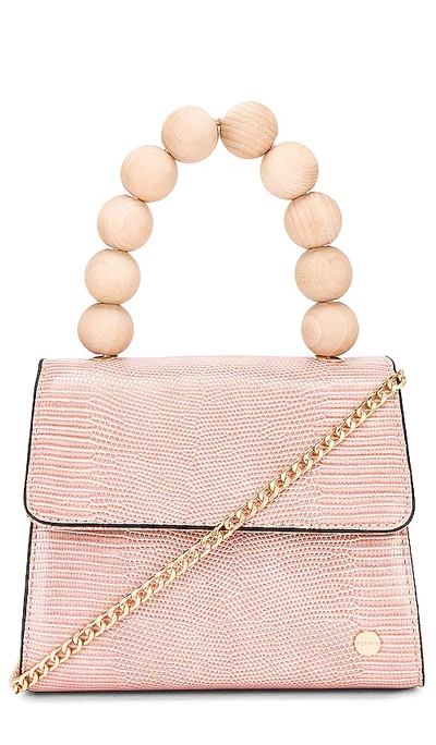 Olga Berg Caylee Wooden Bead Top Handle Bag In Pink
