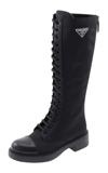 PRADA LEATHER-TRIMMED NYLON LACE-UP KNEE BOOTS