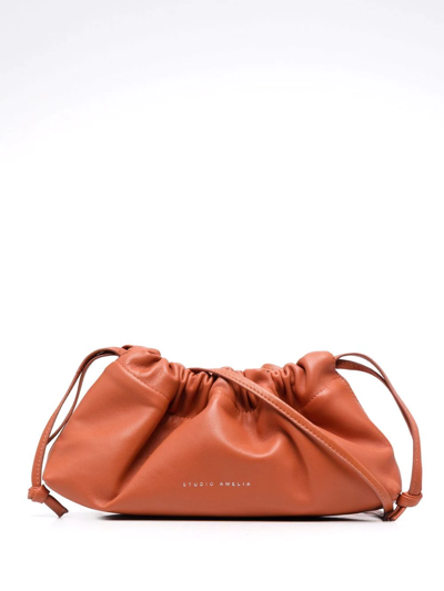 Studio Amelia Mini Drawstring Shoulder Bag In Orange
