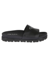 Prada 38 Logo Strap Lug-sole Leather Slides In Black