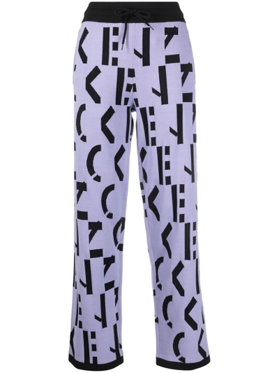 Kenzo All-over Logo-print Trousers In Violett