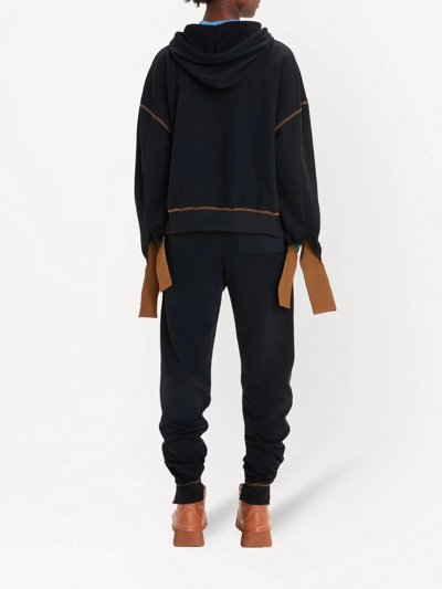 Jw Anderson Tapered Mid-rise Woven Trousers In Black