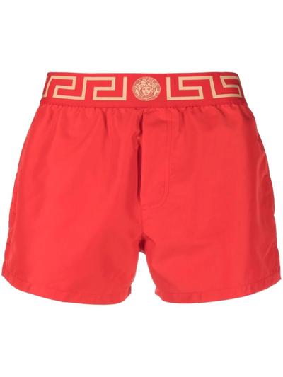 Versace Orange Greca Border Short Swim Shorts In Red