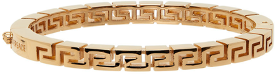 Versace Greca Brass Bangle Bracelet In Giallo
