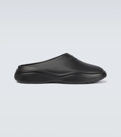 Prada Logo Embossed Foam Mules In Black