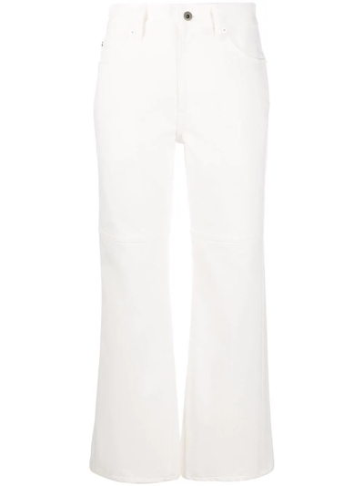 Jil Sander Washed Cotton Denim Flared Jeans In White