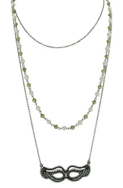 Olivia Welles Triple Layer Beaded Imitation Pearl Mask Pendant Necklace In Antique Silver / Cream