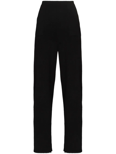 WOLFORD MID-RISE FLARED TROUSERS