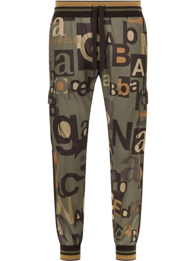 Dolce & Gabbana Jogging Trousers With All-over Logo Print In Verde