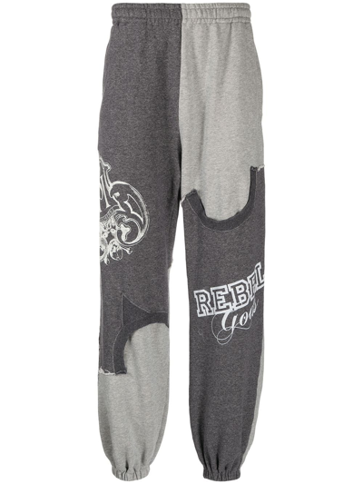 Undercoverism Graphic-print Track Pants In Grey