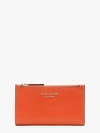 Kate Spade Spencer Small Slim Bifold Wallet In Dried Apricot