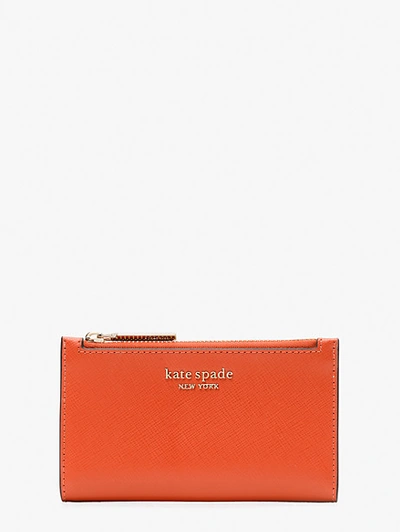 Kate Spade Spencer Small Slim Bifold Wallet In Dried Apricot