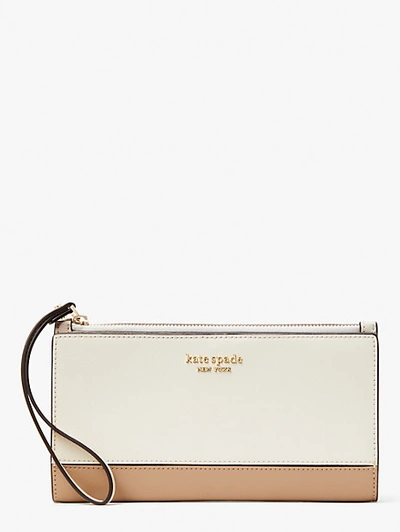 Kate Spade Spencer Continental Wristlet In Parchment/raw Pecan