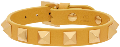 Valentino Garavani Yellow Leather Rockstud Bracelet In Yellow,gold