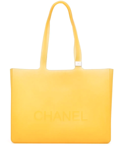 Pre-owned Chanel 2010s Debossed-logo Tote Bag In Yellow
