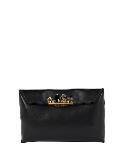 Alexander Mcqueen Skull Four Ring Leather Pouch In Black