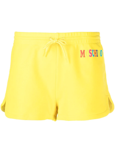 Moschino Ladies Yellow Logo-print Track Shorts In Transparent