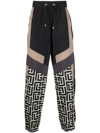 Balmain Jogging Pants With Maxi Monogram Logo Print In Schwarz