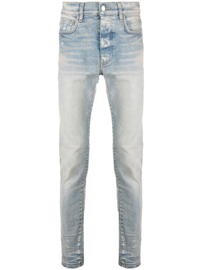 Amiri Logo-patch Stonewashed Skinny Jeans In Blau