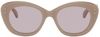 Alaïa Monochromatic Cat-eye Sunglasses In Nude