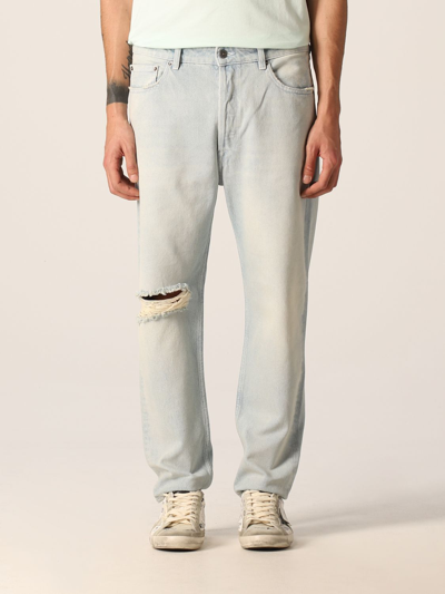 Golden Goose Distressed Logo Patch Jeans In Gnawed Blue