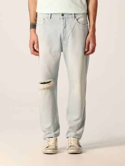 Golden Goose Distressed Logo Patch Jeans In Light Blue