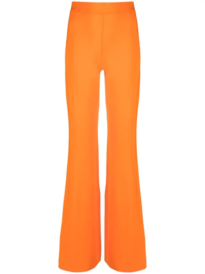 The Andamane Gaia Flared Trousers In Orange