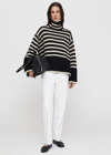 Totême Striped Wool And Cotton Turtleneck Sweater In Black Stripe