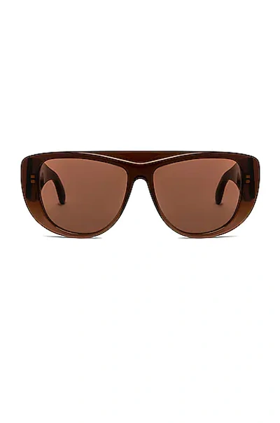 Alaïa Cutout Petal Acetate Cat-eye Sunglasses In 003 Dark Brown