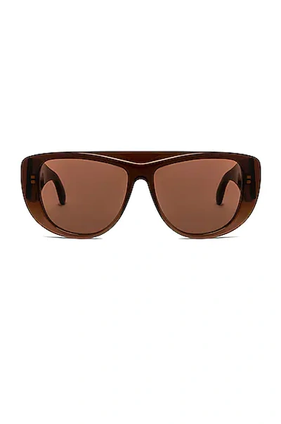 Alaïa Cutout Petal Acetate Cat-eye Sunglasses In 003 Brown