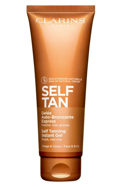 CLARINS SELF TANNING FACE & BODY TINTED GEL, 4.4 OZ