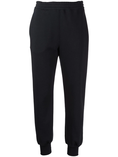 Alexander Mcqueen Embroidered Cotton-jersey Track Pants In Black