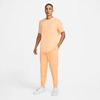 Nike Sportswear Club Fleece Cuffed Jogger Pants In Orange Chalk/orange Chalk/white