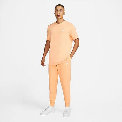Nike Sportswear Club Fleece Cuffed Jogger Pants In Orange Chalk/orange Chalk/white