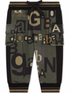 DOLCE & GABBANA ALL OVER LOGO-PRINT TRACK TROUSERS