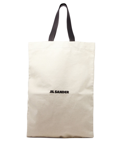 Jil Sander Logo Printed Oversize Tote Bag In Beige