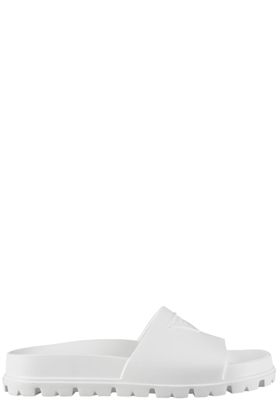 Prada Triangle Logo-embossed Lug-sole Slides In White