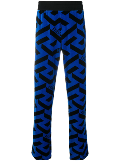 Versace Jersey Jacquard Monogram Print Track Trousers In Blue