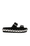 Alaïa Bombe Embellished Suede Slides In Noir