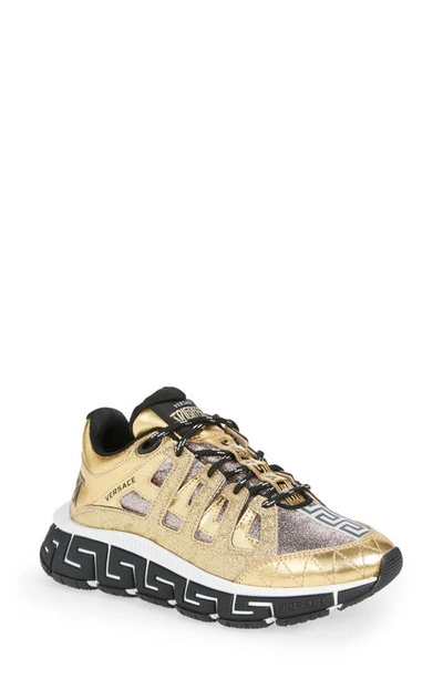 Versace Trigreca Metallic Fashion Trainer Sneakers In Gold