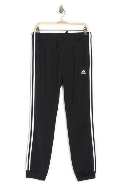 Adidas Originals Primegreen Essentials Warm-up Slim Tapered 3-stripes Track Pants In Black