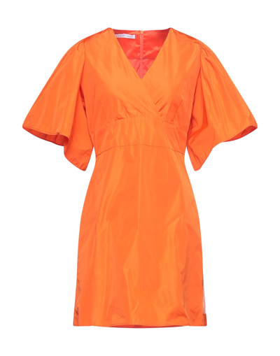 Caractere Short Dresses In Orange